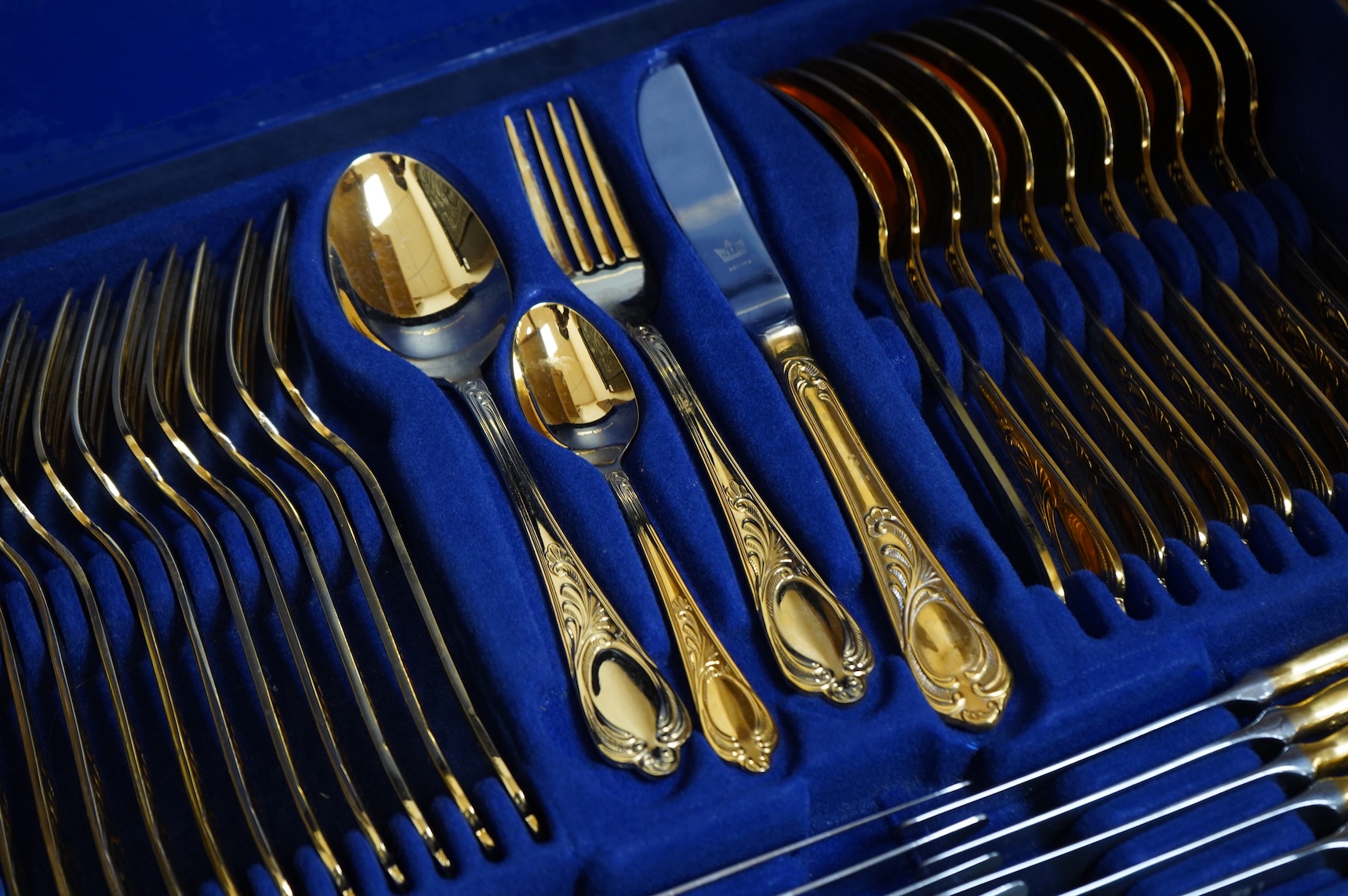 A Bestecke Solingen gold plated canteen of cutlery